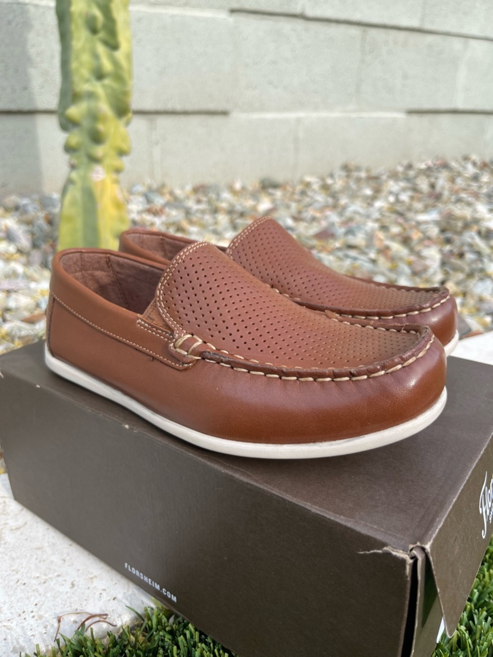 Kids Florsheim Brown Perforated Leather Slip-On Loafers with White Sole.